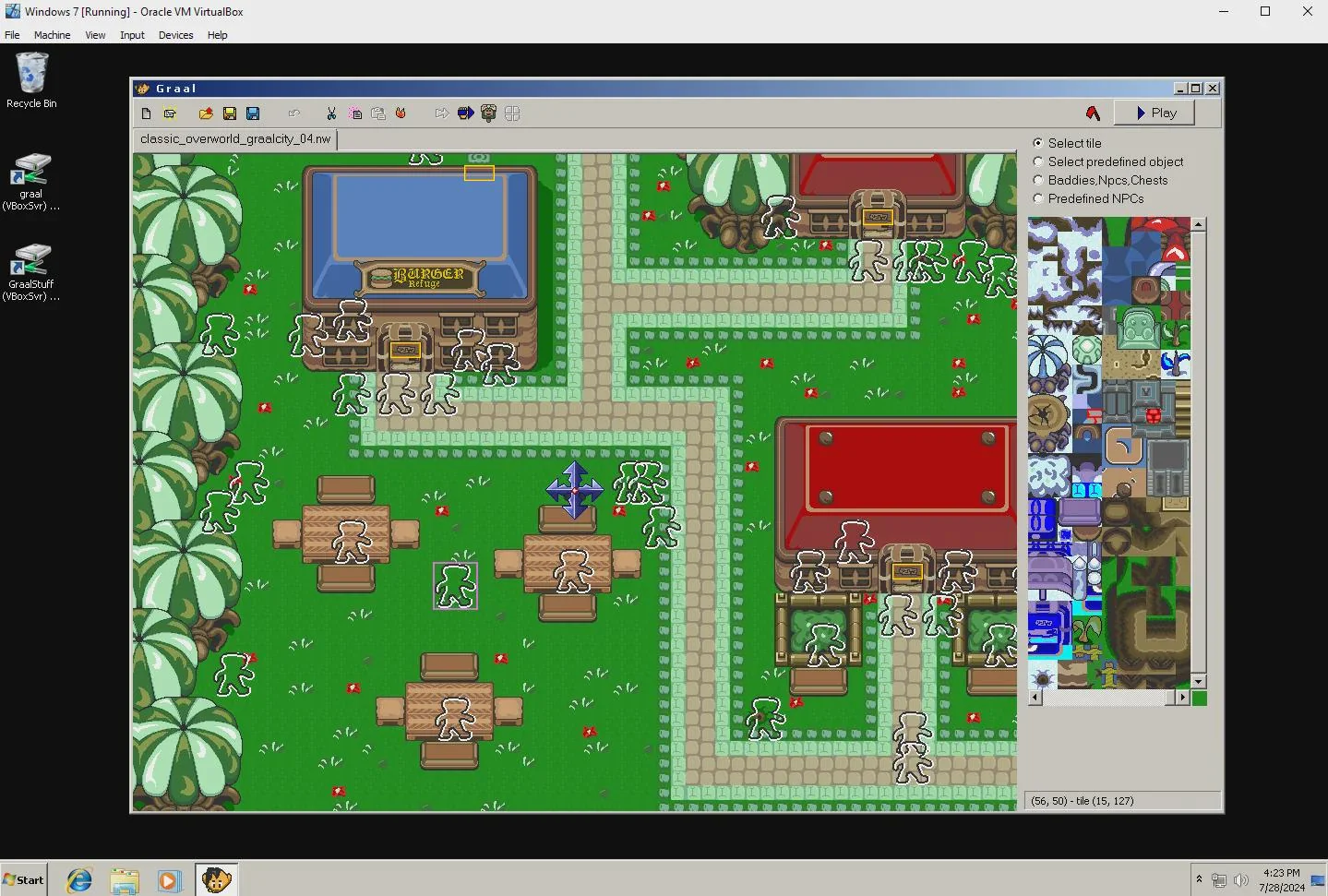 The classic Graal level editor open in a Windows 7 VirtualBox VM, showing a town map and the tileset palette